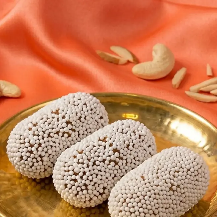 Bal mithai coated in sugar balls
